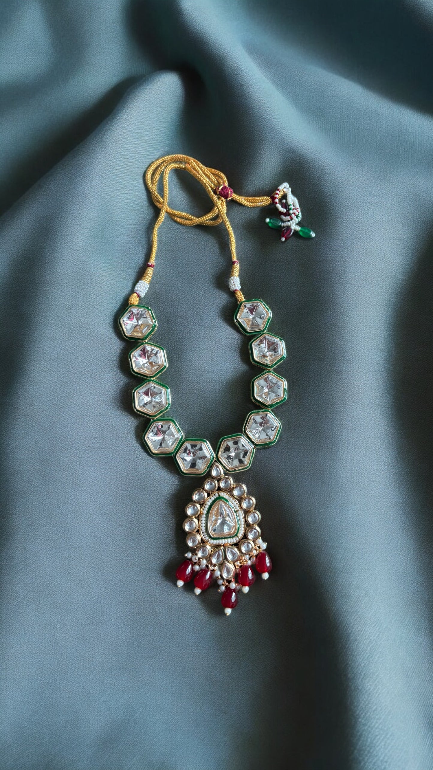 Kundan necklace with earrings with red beads