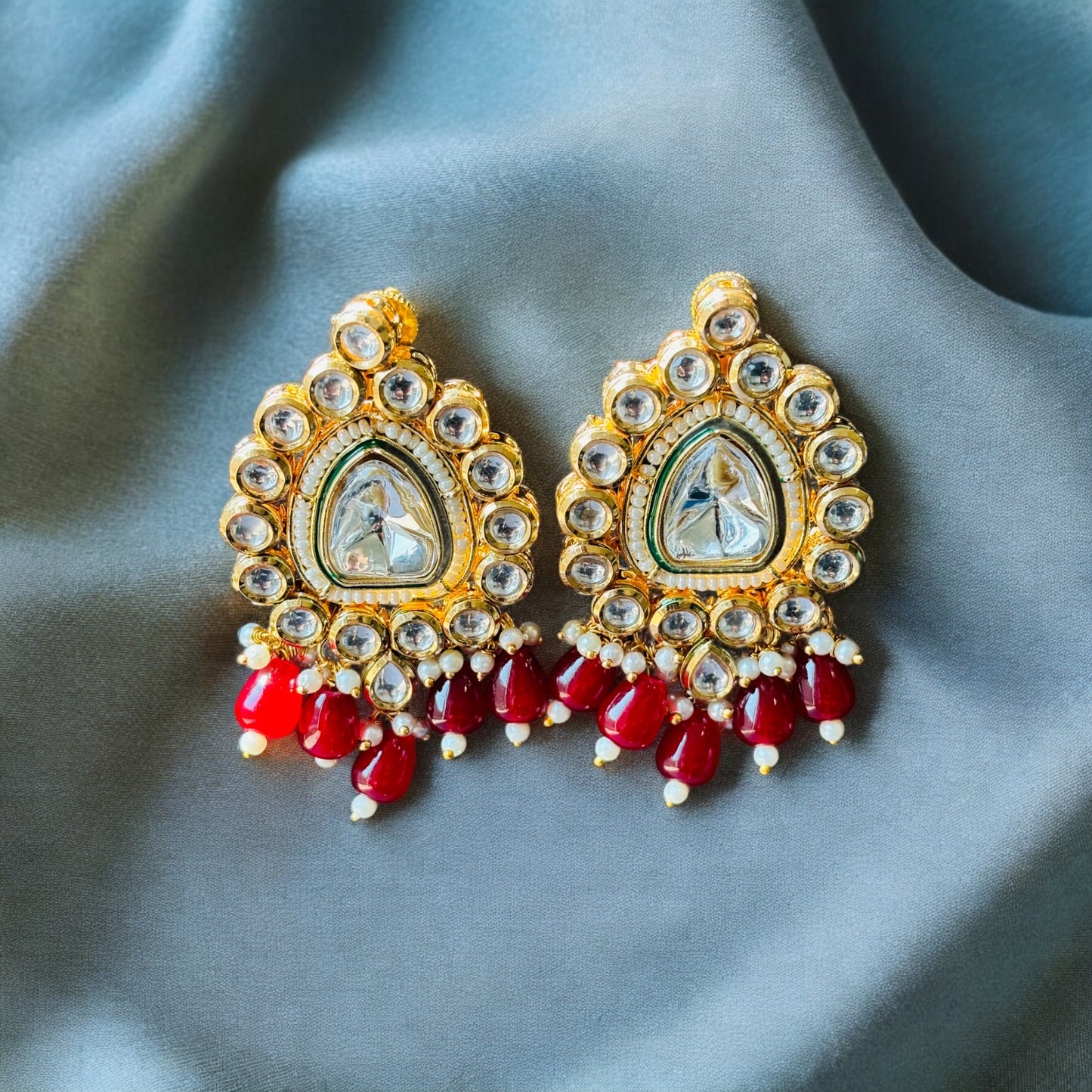 Kundan necklace with earrings with red beads